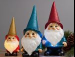 three garden gnome decorations light up with battery wall adapter
